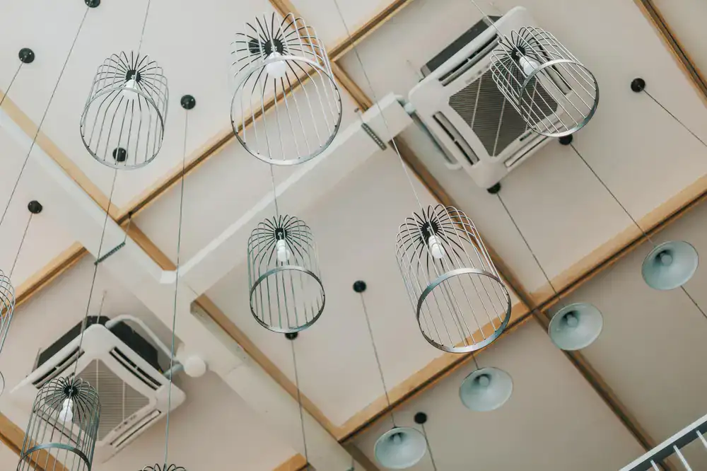 Cleaning dust off a modern ceiling fan and high ledges